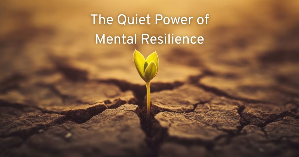 a sprouting plant pushing its way through dry cracked land showing quiet mental resilience to grow