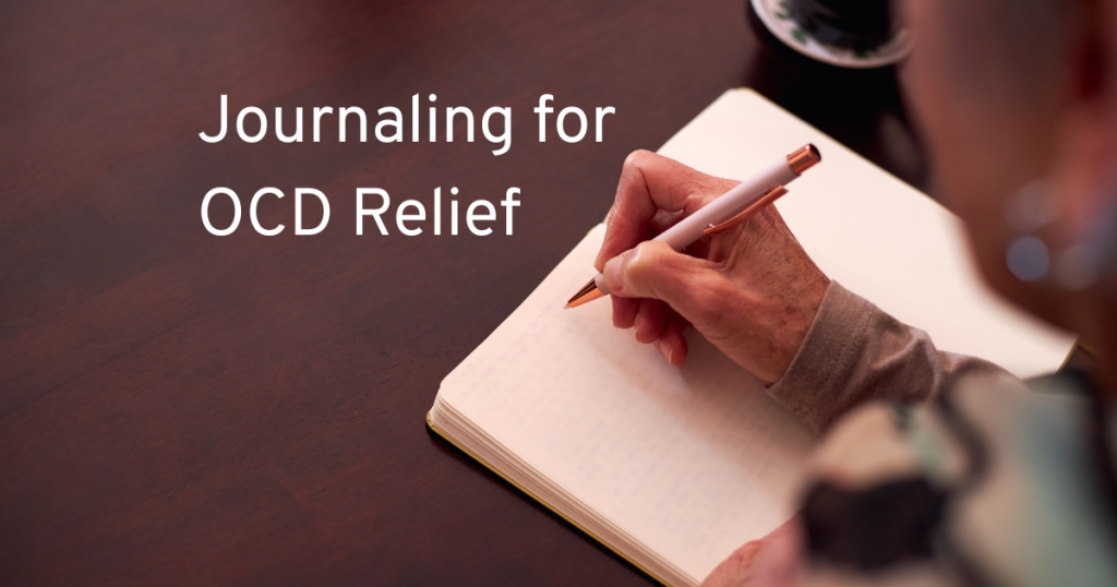 someone about to write in an open page of a book on a table. journaling for ocd relief can be a great coping technique