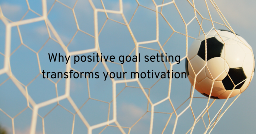 kicking a football into the back of the net showing why positive goal setting transforms your motivation