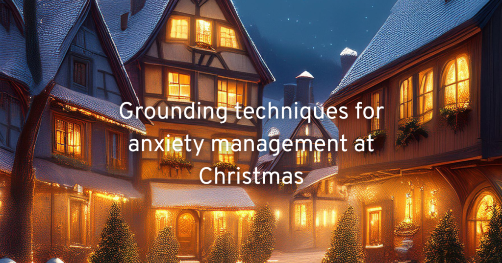 cosy christmas snowy village with grand edwardian buildings lit up and christmas trees showing a lovely scene with text that reads grounding techniques for anxiety management at christmas