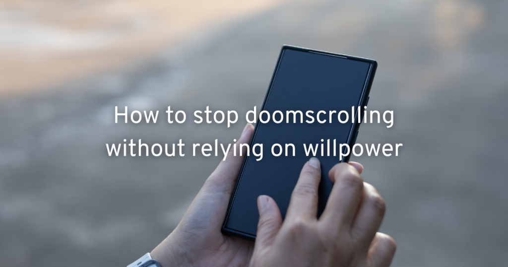 someone scrolling on a black phone whilst walking and learning how to stop doomscrolling without replying on will power