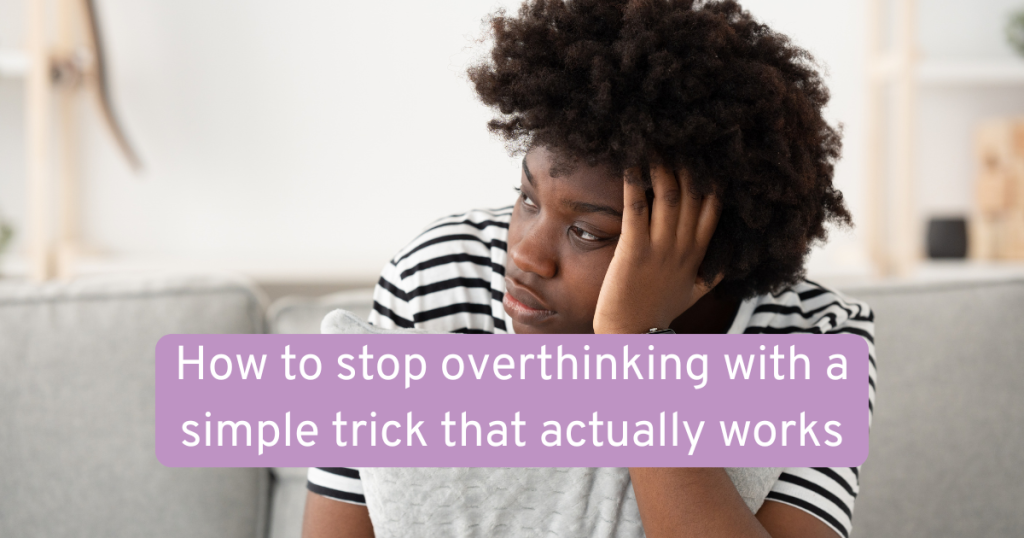 a woman sat with her head in her hand and wondering how to stop overthinking with a simple trick that actually works