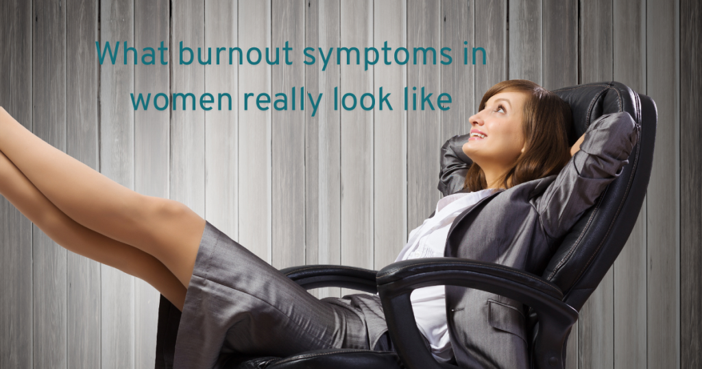 high performing business woman sat in a chair with her feet up and her hands behind her b=head smiling showing us that burnout in women can look like all is fine from the outside and explaining the blog tells us what it really looks like
