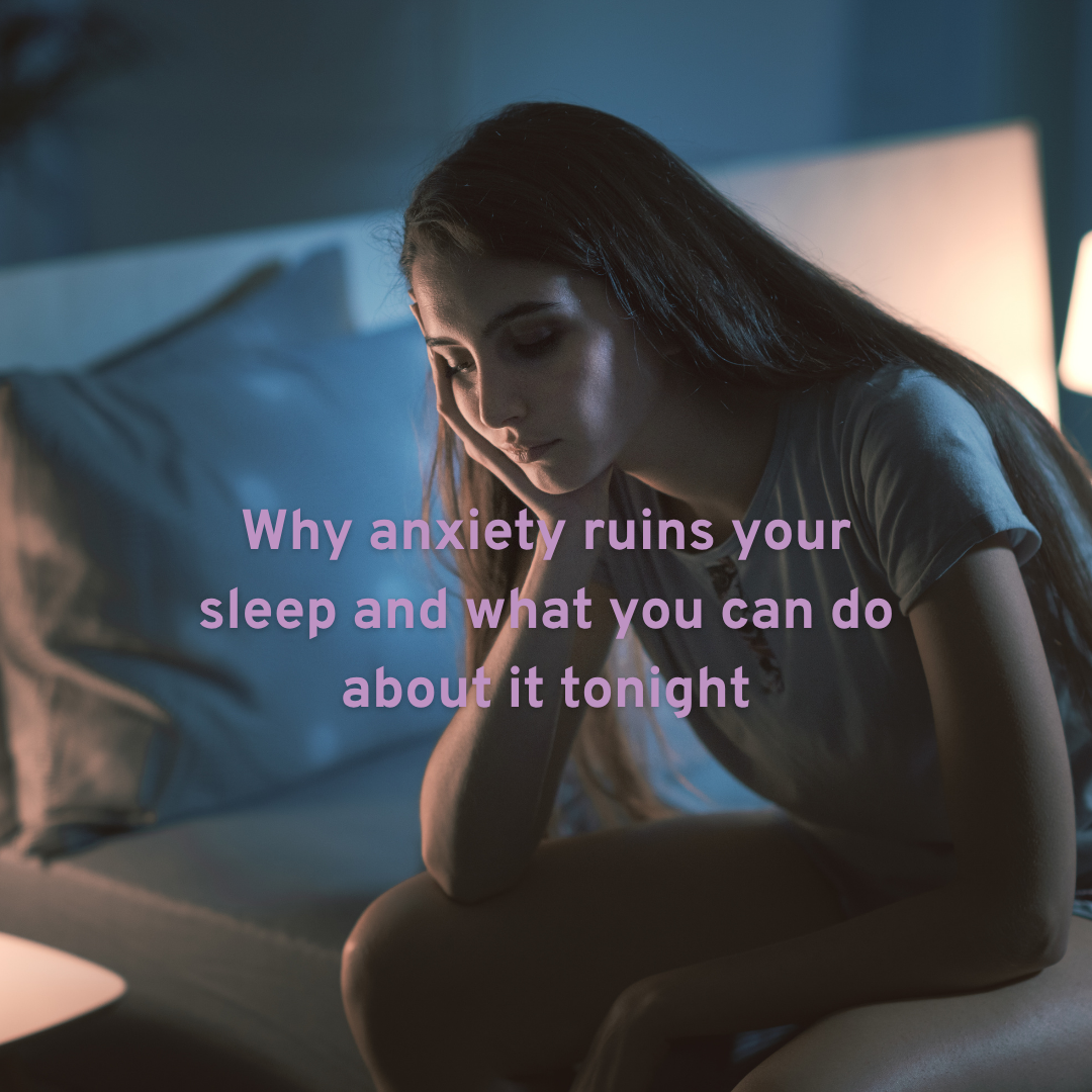 young lady sat on a bed head on her hand wanting to not let anxiety ruin her sleep with text